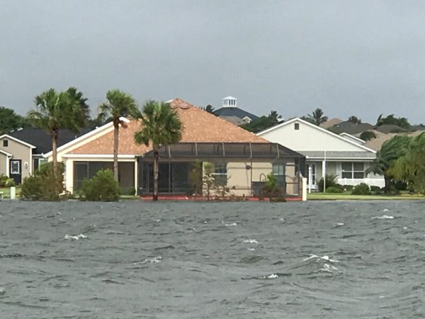 Homes normally 12-15 feet from the lake in the Village of Sanibel had flood waters touching their back porches. 