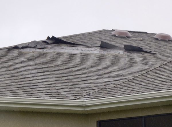 Roof shingles removed in Village of Pinellas