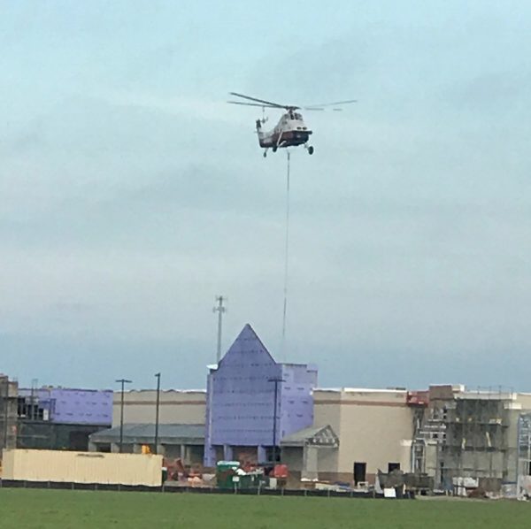Helicopter lifting AC unit onto Lowe's (1)