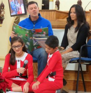 Dave and Retzel O'Brien and their children Clare and Toby shared a Christmas story on stage