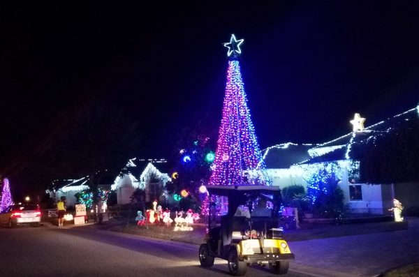 Golf carts and cars lined Dunkirk Trail all through the night to get a chance to see the Christmas Lights