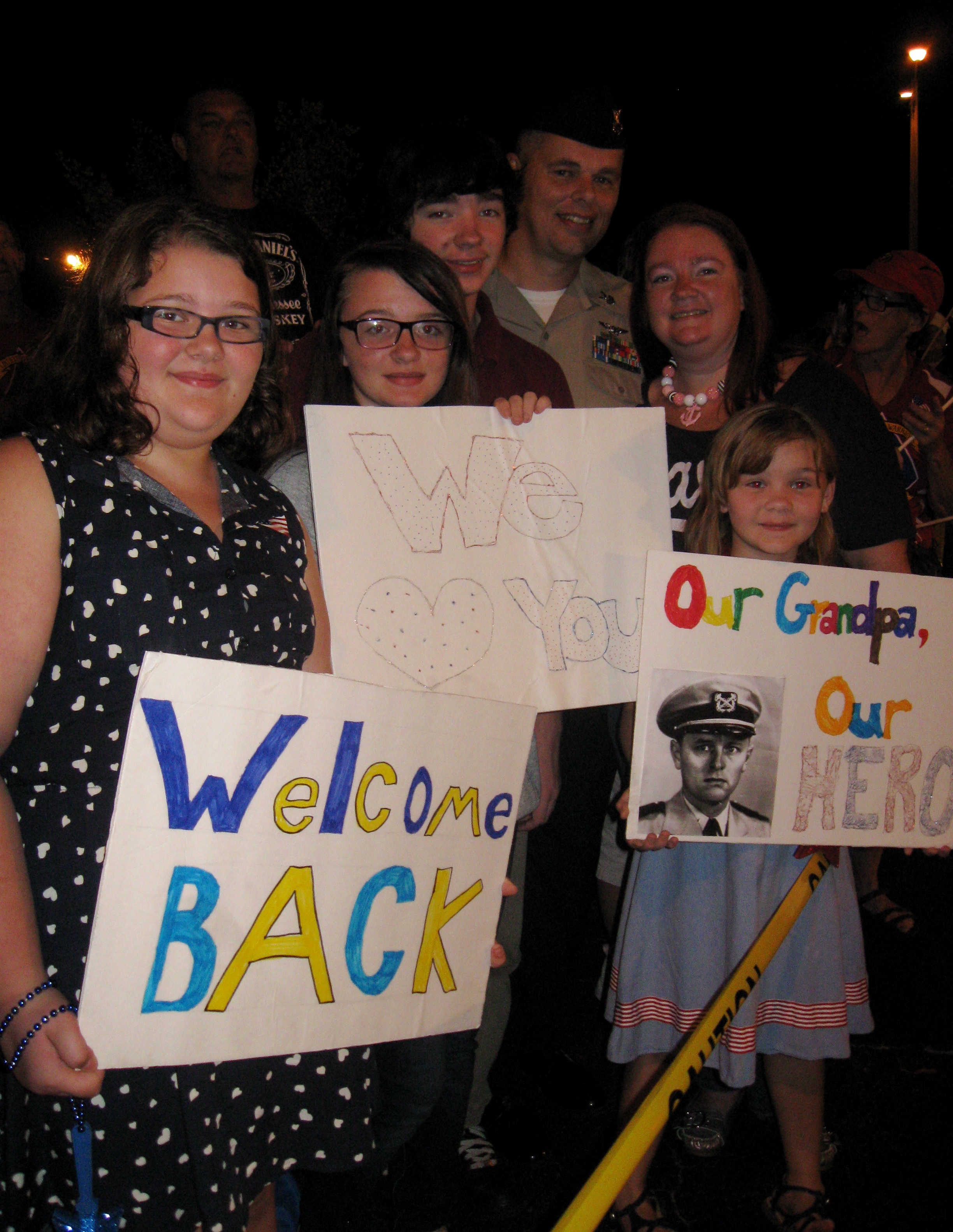 Families gather to welcome home veterans returning on Villages Honor Flight