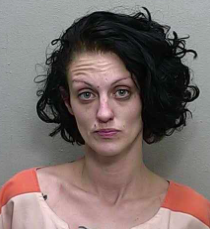 Woman arrested after allegedly throwing can of soda at 67-year-old man ...