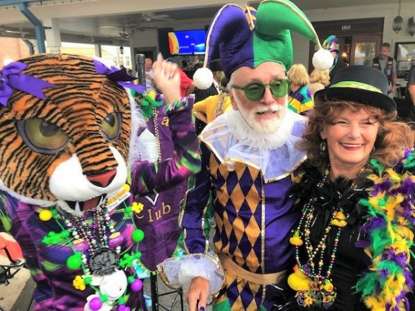 Villagers flock to Lake Sumter Landing for annual Mardi Gras ...