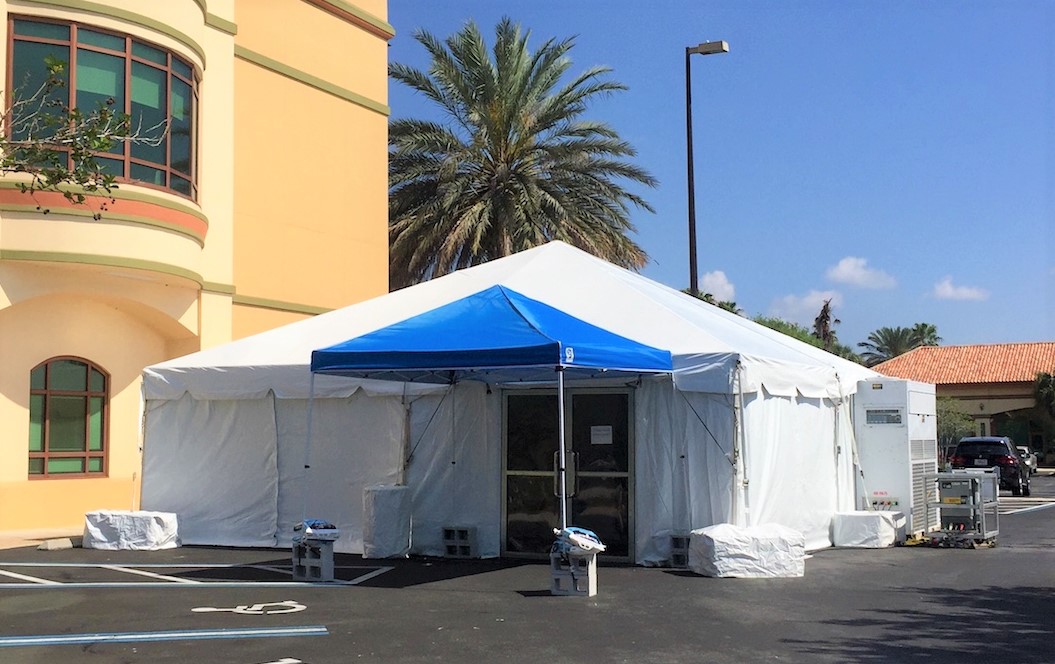 Triage tent erected at Villages hospital to separate patients with ...