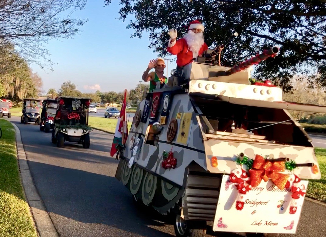 Villagers share Christmas spirit with sunset golf cart parade ...