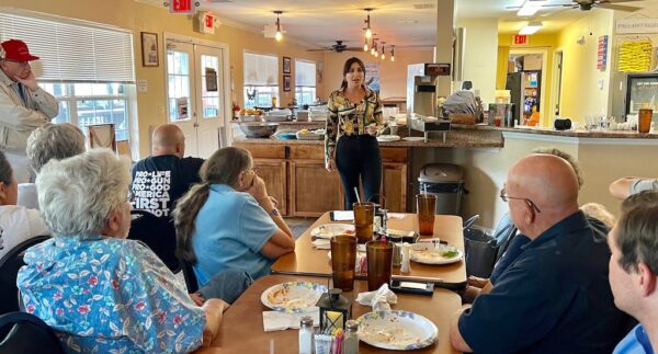 Laura Loomer speaks during the town hall event