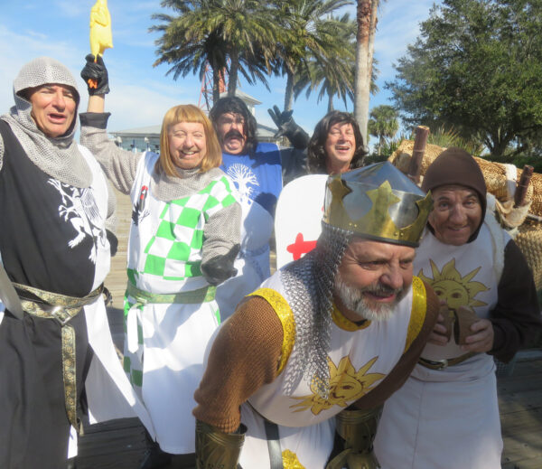 Garry Gibbons as King Arthur leads his merry Knights from Spamalot to Lake Sumter Landing