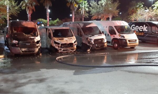 These service vehicles were burned in the parking lot of Best Buy in Lady Lake