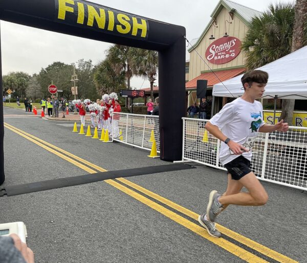 Villages High School student finishes first at Running of the Squares