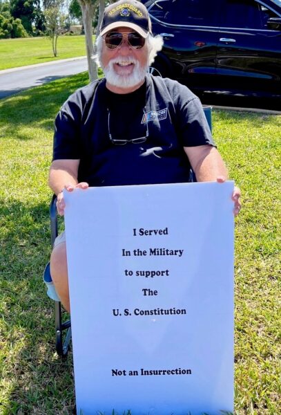 Vietnam veteran Gerry Allen protested outside the event