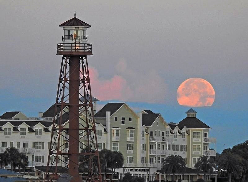 Beautiful full moon over the Lake Sumter Landing lighthouse
