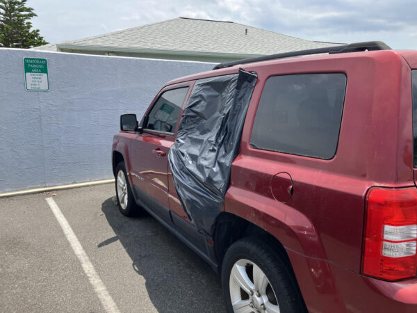 This red vehicle was parked Friday in guest parking at Villa Valdosta