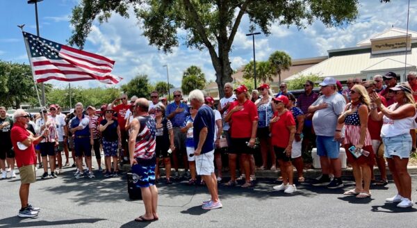 Members of the Vilages MAGA recited the oath of allegiance before the golf cart parade