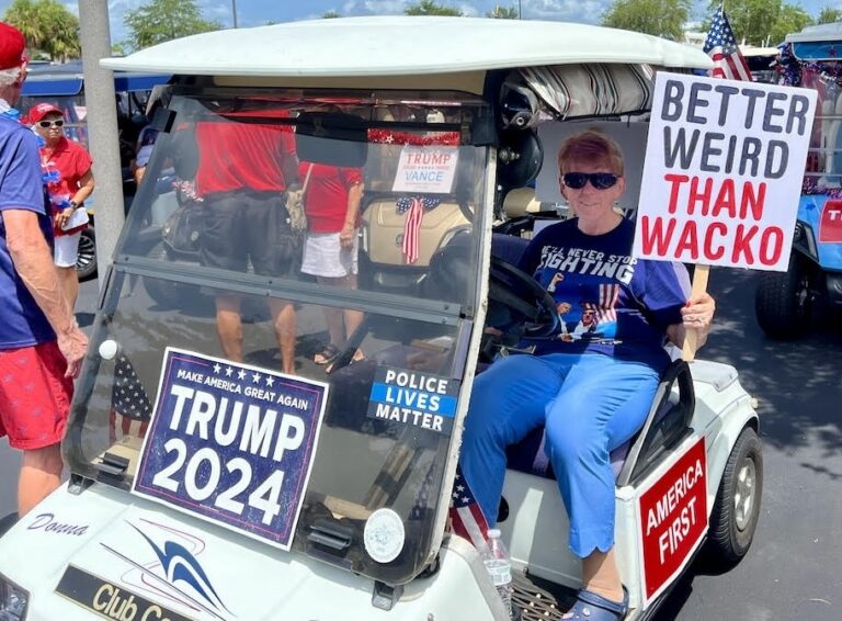 Donna Hoak led Saturday s golf cart parade in support of Donald Trump