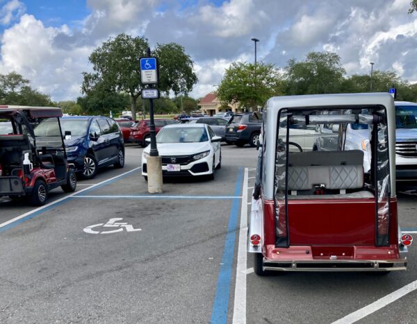 This golf cart was parked in a zone meant to accommodate the handicapped at Southern Trace Plaza