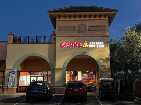 Crave Hot Dogs BBQ and Beer opens in Rolling Acres Plaza