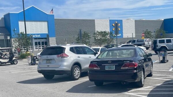 Two cars were spotted in the golf cart parking area at the Walmart in Summerfield. 2