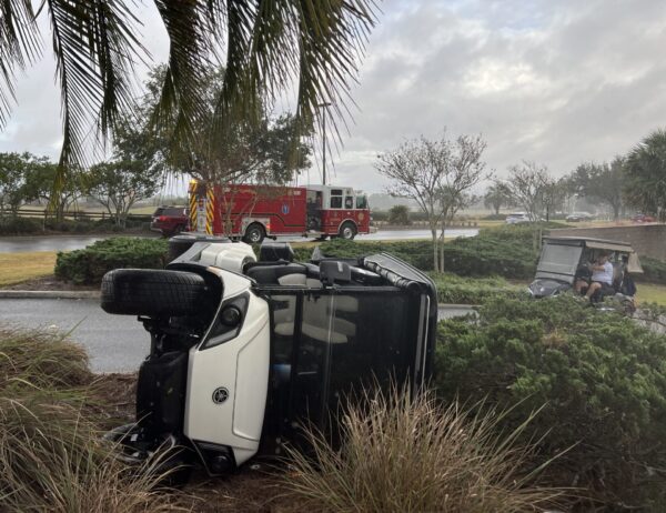 A person who had been traveling in this golf cart was transported from the scene ofa rollover accident