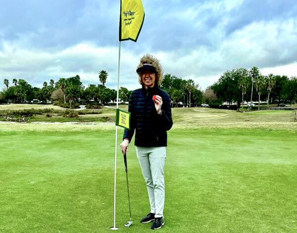 Lynn Kelley of the Village of Dunedin got her first hole in one despite cold, windy conditions