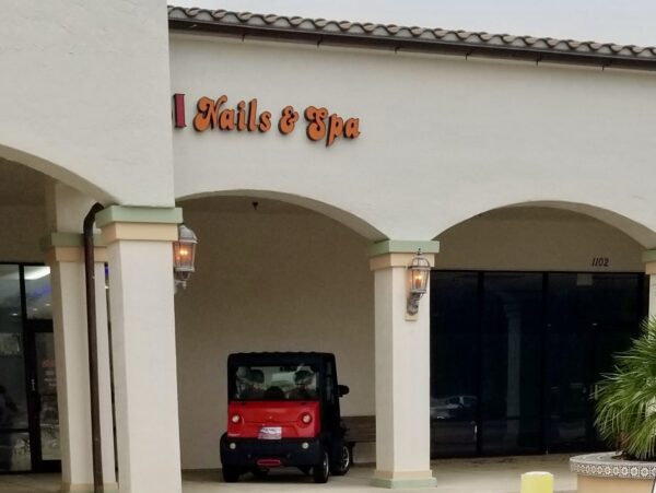 This golf cart enjoyed VIP parking at a nail salon in The Villages