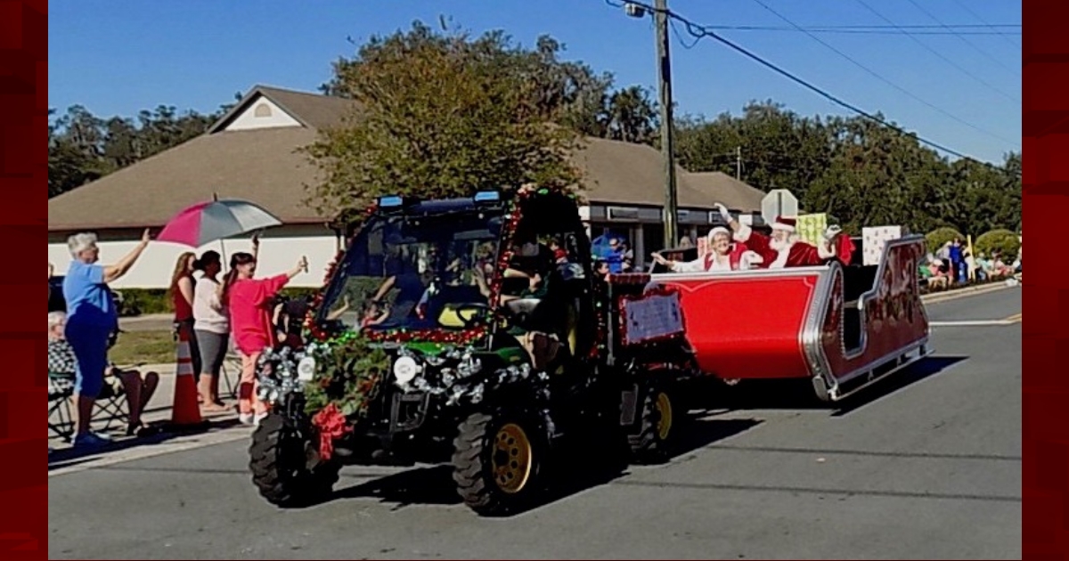 Families line route of Lady Lake Christmas Parade
