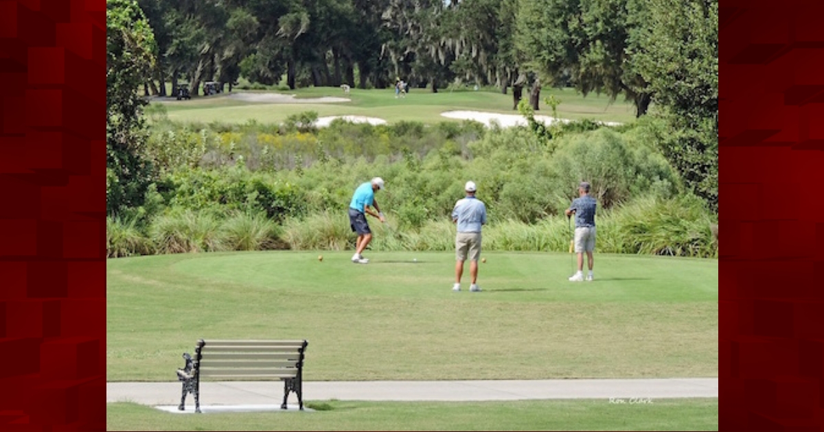 Golfers playing on Pelican Executive Golf Course in The Villages